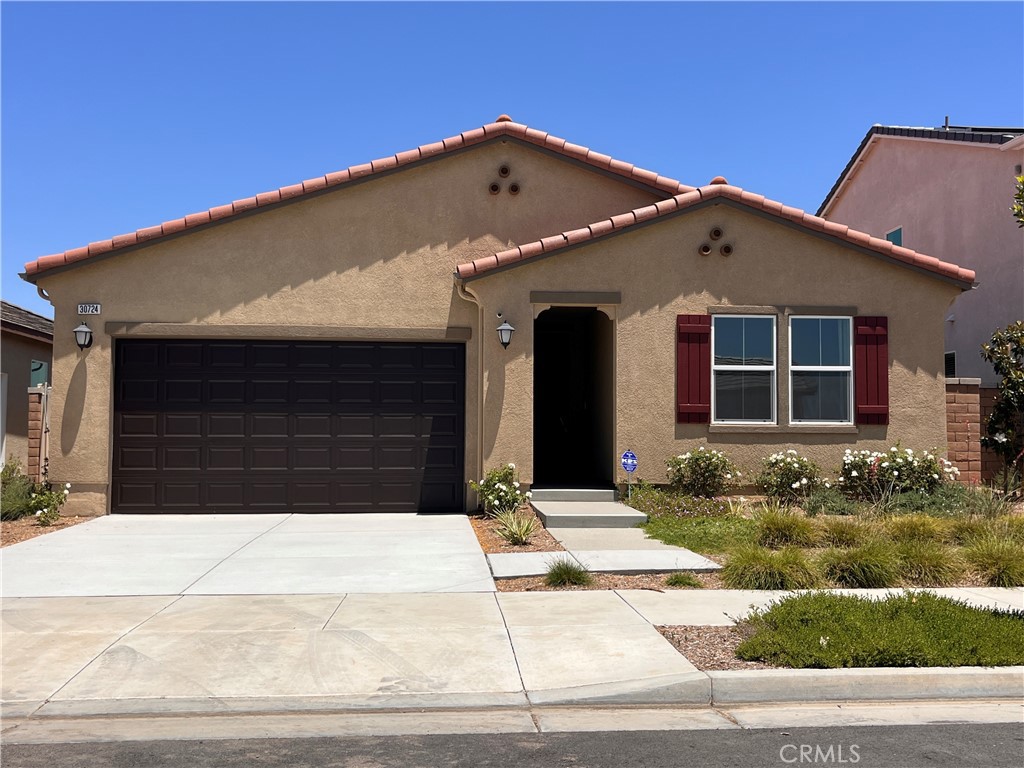 One of its kind. Former model home, highly upgraded, brand new, never lived in, ready for move in. Great floor plan, bright, with hard surface flooring in living areas, carpets in bedrooms, upgraded tile in master bathroom, nice backyard, fully landscaped with artificial grass and planters. Washer/dryer and fridge already there. Solar panels. Definitely a very unique opportunity. No pets please.