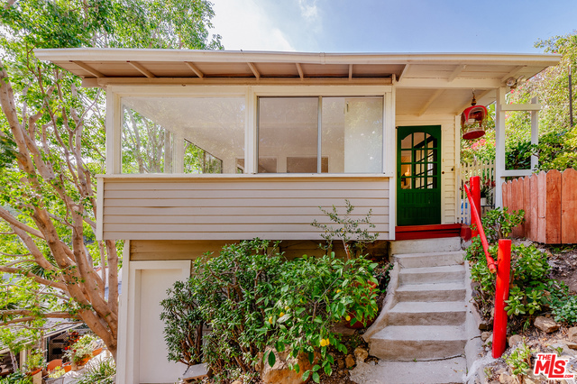 Just minutes above Hollywood sits this legendary 'Tree house' guest cottage with one bedroom plus a den. Enter through a wooden gate into an enchanted garden and park like setting. A stone walkway leads through citrus and apple trees over a wooden bridge to your charming Hollywood Hills retreat. This is a very special place for the artistic spirit who needs quiet and serenity to accomplish their work. It has been home to world renowned artists over the years. Enjoy the good karma!