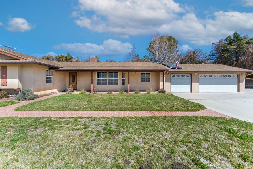 SUBJECT TO FINAL SHORT SALE APPROVAL! Everything you need is waiting for you in this lovely bright and light Single Family Ranch Home siting on a 2.5 acres of land in Beautiful Leona Valley with breathtaking views of the mountains!!! Featuring Open Floor Plan* Cozy Brick Fireplace * Wood and Tile Flooring * Master Bedroom with Walk-in Closet * Master Bathroom with Dual Sinks * Separate Tub & Shower * The nicely sized additional bedrooms with guest bathrooms. Huge Covered Patio Looking onto Lovely Mature Landscaping. An outdoor living space for the family & entertaining. There's also an approx. 1,500SF Workshop with 2 Roll Up Doors and Cars with 220 Power. Hay Barn/Tack Room * Chicken Coop * AVEK Turnout w/ Water Tank * 3 Car Garage * Fenced areas good for horses and other animals * A wonderful opportunity for a Home Sweet Home. Don't miss the opportunity to make this your own!!!