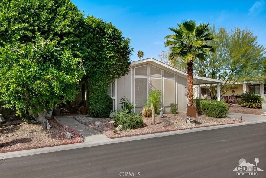 Open floor plan light and bright. Come take a LOOK! Spacious Double wide. Two Large Bedrooms each with full bathrooms. Great Room. Gourmet Kitchen with sit down counter,.Three ceiling fans, tile floors and counter tops, Formal Dining room. Laundry room with sink, washer and dryer. Spacious Patio with Mountain Views! Space rent is only $550.00 per month. Walk to Pool, Clubhouse, Tennis or try a round of Golf! Come take a LOOK! Home can be seen on short notice Suncrest is a Senior Park 55+. Gated Community! Some furniture available, 220 wiring for electric car.