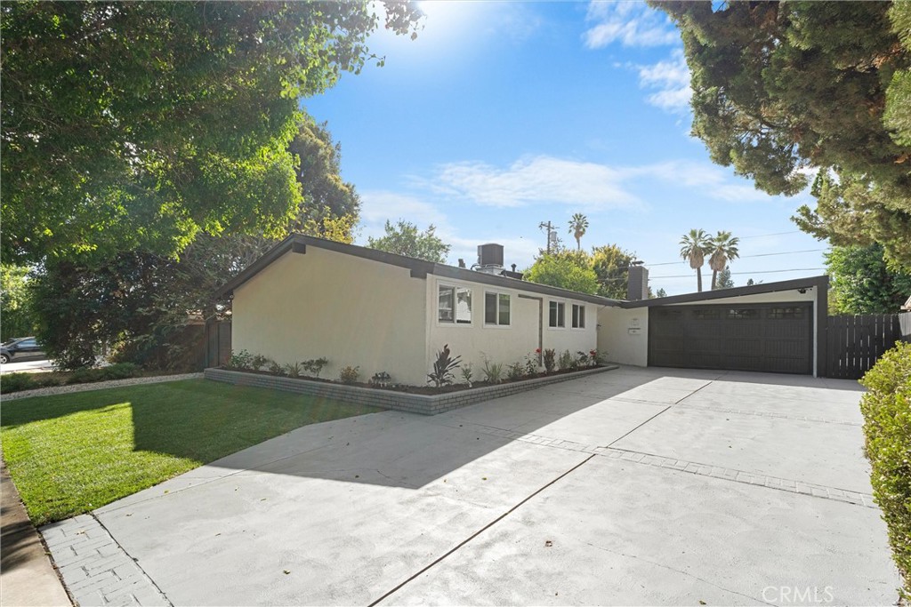 Welcome to 8223 Garden Grove Ave! This beautifully remodeled 4-bedroom, 2-bathroom home offers 1,540 sq ft of modern living in one of Reseda’s most desirable neighborhoods. Nestled at the end of a quiet cul-de-sac on a tree-lined street, this property perfectly balances comfort, style, and convenience. Step inside to soaring vaulted ceilings and an open, light-filled floor plan. The home has been thoughtfully upgraded throughout with a brand-new kitchen, remodeled bathrooms, new flooring, new roof, and upgraded electrical panel—giving you peace of mind and move-in readiness.
The sleek kitchen features fresh cabinetry, quartz countertops, and stainless-steel appliances, while both bathrooms shine with contemporary finishes. The spacious living areas flow seamlessly, creating an inviting atmosphere for entertaining or everyday living. Outside, enjoy your own private oasis with a sparkling pool, ideal for summer gatherings and weekend relaxation. The cul-de-sac location ensures low traffic and added privacy, making it a wonderful setting for families.