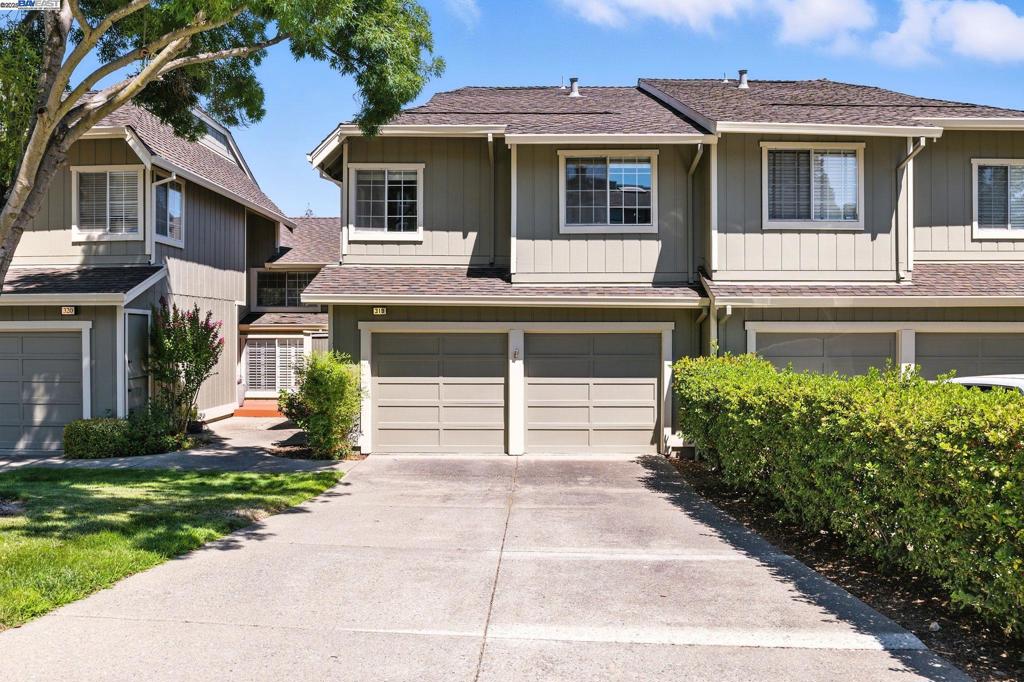 Located in the Cresthill neighborhood, this townhome overlooks mature trees & landscaped greenbelt. Conveniently located near the Sunvalley Shopping Mall, Downtown Pleasant Hill, Diablo Valley College, Highway 4, 680 Freeway, Pleasant Hill BART, Schools, Parks & Hiking Trails. Private front patio, Parquet Wood Flooring entry w/convenient half bathroom & interior access to the 2 car garage. Split-level design with stairs leading down to the formal dining room w/plantation shutters, built-in serving buffet & plenty of cabinets for storage. Large living room has a brick gas fireplace w/mantle & plantations shutters. Kitchen features breakfast bar, built-in desk, white tile countertops, white appliances including smooth top electric range & walk-in pantry. Breakfast Nook off kitchen has sliding glass door to backyard deck for dining al fresco. Upstairs over-sized Primary Suite w/sitting area & lovely views, attached bath w/large dual sinks vanity, walk-in closet, jetted soaking tub & stall shower. Secondary bedrooms have ceiling fans. Hall bathroom has dual sinks & shower/tub combo. Upstairs Laundry. Private garden patio in backyard has rose bushes & gate access to community greenbelt & walkways. HUGE unfinished basement storage under house. HOA has Community Pool & Tennis Courts.