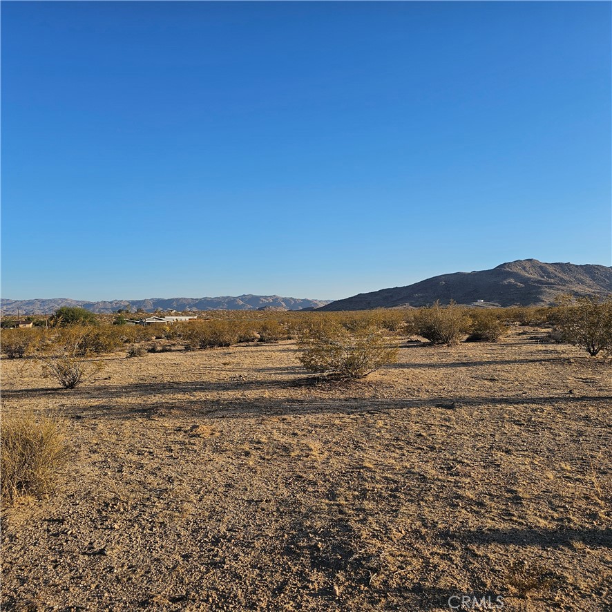 Embrace the call of the wild with this 2.5-acre desert land parcel, perfectly situated for those seeking adventure and solitude. This property offers an authentic desert experience with wide open spaces and direct access to rugged beauty of the landscape. If you're looking for a raw, untamed piece of desert to call your own, this is your chance to stake your claim!
Buyer to independently verify all MLS information, including, but not limited to, permits, property use, bedroom/bathroom counts, square footage, school districts, and enrollment availability. Buyer is strongly encouraged to conduct their own investigations and inspections to confirm the accuracy of all information provided.
It is the buyer’s sole responsibility to verify access to utilities (including water and power), zoning designations, and applicable county or city building requirements. Buyers are advised to perform thorough due diligence and consult with appropriate licensed professionals to ensure the property meets their needs and intended use.
Address is for marketing purposes only.