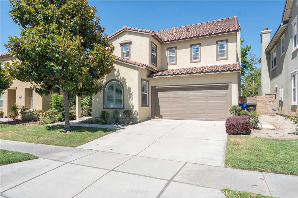 Don’t miss this rare opportunity to purchase in the beautiful gated community of Vintner's Grove. This large 3 story home features 5 bedrooms, 3 full bathrooms and almost 3100 square feet of living space. The main level has a separate living room and dining room at the front of the house, plus an open great room at the rear with a large kitchen, family room and dining area. The remodeled kitchen features new white cabinets, quartz counter tops, built-in stainless-steel appliances and a large island. You’ll also find a bedroom and full bathroom on the main floor. On the second level, there’s a huge primary bedroom and an attached bathroom with dual sinks, a separate shower and tub, and 2 large walk-in closets. The second level also has a laundry room, 3 additional bedrooms, and a full bathroom. And on the third level is a bonus room perfect for a game room, media room, a den, or a 6th bedroom. And the home is within walking distance of the Vintner’s Grove community area which features a resort style pool, a separate jacuzzi area, a children’s wading pool, and bathroom/changing rooms. You’ll also have access to a built-in barbecue and a children’s playground.