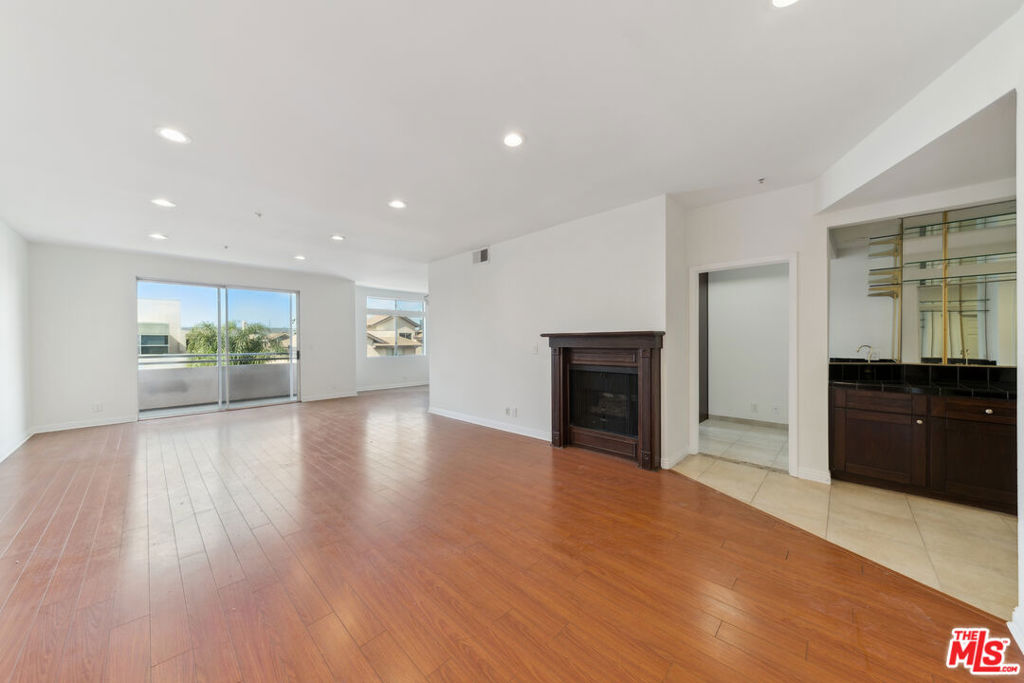 Tenant Pays: Gas, Electricity, and Trash. Owner Pays: Water, Land scaping, Parking : 2 Tandem Garage Parking Spaces Included Gated building, In unit laundry hookups! Refrigerator Not Included! Pets Allowed. Close to UCLA! Available Immediately! Welcome to this stunning 2-bedroom, 2-bathroom haven nestled in the heart of the coveted Westwood neighborhood, just moments away from UCLA. Step into this inviting unit and be embraced by its expansive open floor plan, illuminated by abundant natural light dancing off the gleaming hardwood laminate floors. This meticulously updated residence boasts a suite of stainless steel appliances adorning the modern kitchen, complemented by elegant granite countertops and recessed lighting throughout. The spacious living area extends seamlessly onto a generous balcony, offering the perfect sanctuary for relaxation or unwinding after a bustling day. Convenience is key with in-unit laundry hookups and ample storage space thoughtfully integrated throughout the unit. The master bedroom beckons with its luxurious amenities, including a separate Jacuzzi tub and shower, as well as a walk-in closet for added comfort and organization. Parking is a breeze with two tandem spots included within the secure gated entry and parking area, providing peace of mind and ease of access. Don't miss the opportunity to call this Westwood gem your new home sweet home. Schedule your viewing today!
