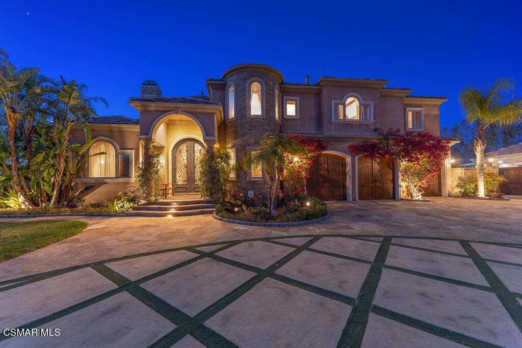 A hidden sanctuary on a hilltop in Southwest Simi Valley, this thoughtfully designed custom-built Mediterranean style home on 3.8 acres offers 360 degree breath taking views. Big backyard with duel level Koi pound has waterfall with living turtles, entertaining areas which include Infinity Pebble Tec pool with Baja shelfs and multicolor changing lights, rock waterfall with underneath grotto, fountain, slide, private spa, stone-surround fire pit, the outdoor kitchen, RV access, hillside avocado and various fruit orchard, kids playground, sports ground, vegetable garden, own solar system on the slope with capacity 29967 KW per year. Seller has architectural plans for well drilling with connection to the whole water system on the property. This amazing estate of a total 7,429.5 SqFeet living space includes 5,326 sq ft main house with 4 bds and 3,5 ba and 2 view balconies; 1,202.5 sq ft guest house with 2 bedroom, 2 bathrooms, living room, granite fireplace, and a balcony built in 2017; 484.5 sq ft wellness center house with cedar sauna, steam room, infrared sauna, large resting room with massage tables built in 2014; 112 sq ft playhouse with with retractable staircase to the capacious attic and its own half bath; 304.5 sq ft subterranean wine cellar. Marvelous choices of marble, stone and wood harmonize every room with dignified decorum. The chef will love the enticing kitchen with stainless steel Thermador professional appliances, granite counters, hand carved spacious cabinets and dramatic views from every window. Many more amenities! Everyone will find their favorite place in this beautiful property!