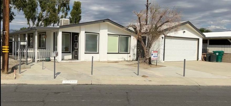 Attractive home with two-car garage in Tri-Palms community where you own the land,  Newer AC/Furnace and stove/range.  Floors replaced within past two years.  Brick  privacy walls surround the property sides and rear.  Beautiful courtyard for entertaining.  Enjoy the club's 18 and 9 hole golf courses, tennis courts, pickle ball,  pools, spas, and much more.   The community is centrally located  near Rancho Mirage and Palm Desert, and a short drive to Palm Springs.   This is an over-55 community offing one of the best values in the desert.