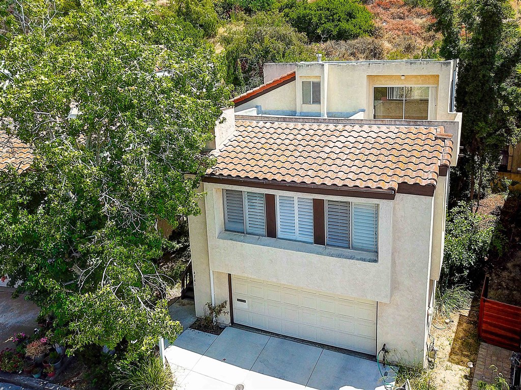 Upgraded Home with New Carpet and Beautiful Wood Floors! Walk to Mission Bay! Amazing quiet location with large private deck with peaceful parklike surroundings. Large Master Bedroom with Balcony! Neighborhoods: Bay Park Equipment: Garage Door Opener, Range/Oven, Water Filtration Other Fees: 0 Sewer: Sewer Connected Topography: LL