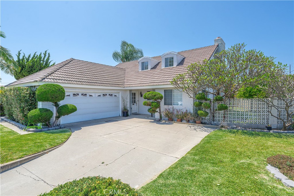 Discover this corner lot home, inviting you to make it your own with limitless potential. Nestled within the charming West Garden Grove Garden Park community, this home stands out as one of the larger models in the neighborhood, boasting 5 bedrooms and 2 full bathrooms. Enjoy the convenience of having two bedrooms and a bathroom located on the first floor, perfect for easy access and everyday living. Spanning over 1,900 sq. ft. of thoughtfully designed living space, this home offers a myriad of possibilities for personalization. The kitchen features generous counter and cupboard space. Flowing seamlessly from the kitchen, the living room opens up to an expansive 6,460 sq. ft. lot, with an ample side yard and grassy area creating tons of potential for entertaining and enjoying outdoor activities. Ideally situated just a leisurely stroll from the picturesque Seal Beach Pier, enriched by access to highly rated schools and the advantage of a low tax rate, with no homeowner's association fees to contend with. For outdoor enthusiasts, Eastgate Park is nearby, with opportunities for recreation. The vibrant West Grove shopping center and the West Grove Cinemas add to the allure, providing countless options for memorable evenings with family and friends. Offering easy access to the 22 and 405 Freeways.