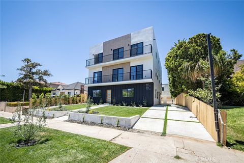 Photo of 1557 S Ogden Drive #1/4, Los Angeles, CA 90019 (MLS # BB26042965)