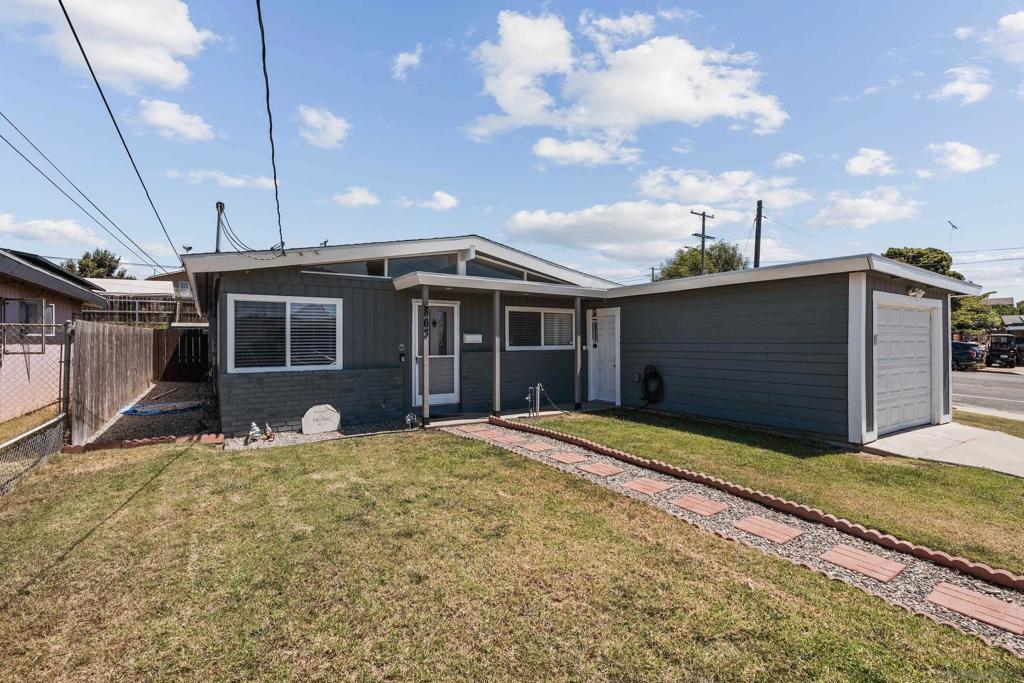 This beautifully updated 3-bedroom, 2-bath home sits on a large 7,000 Sq Ft corner lot and offers the perfect blend of style, comfort, and efficiency. Step inside to find an open and inviting open floor plan with laminate flooring, dual-pane windows and two living areas. The remodeled kitchen features granite countertops, upgraded appliances, and ample storage. Enjoy peace of mind with paid-off solar panels and a brand new central AC. The spacious backyard has a new porch cover, new fencing and room to relax, play, or host gatherings. The attached garage and driveway offer convenient parking. Centrally located, this home is just minutes from 32nd St Naval Base, local parks, shopping, dining, and freeway access, making it easy to enjoy everything San Diego has to offer. An ideal choice for first-time buyers or a growing family, this property is move-in ready and waiting to welcome you home.