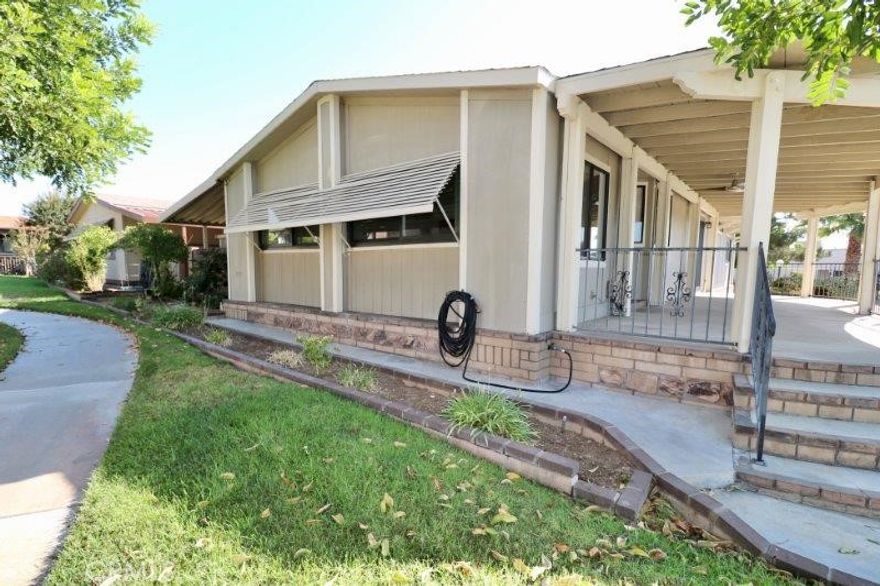 Senior Park Community 55+...Perfect opportunity to buy this beautiful updated home! This beautiful home features 2 bed / 2 full bath open floor plan, with laminate flooring throughout.  A spacious living room features large windows allowing for plenty of natural light and a view of the lush greenbelt.   The newly remodeled open concept kitchen features newer stainless-steel appliances, soft closing cabinets and beautiful quartz countertops.  Just off the kitchen is the den which opens onto the patio area perfect for entertaining family and friends.  The large master bedroom features two closets, in suite bath with dual sinks and tub shower combo.  Located down the hall is the guest bedroom and full bath with walk in shower.



Extras include, updated energy efficient windows, ceiling fans, large custom storage shed.  Look no further schedule a tour today!