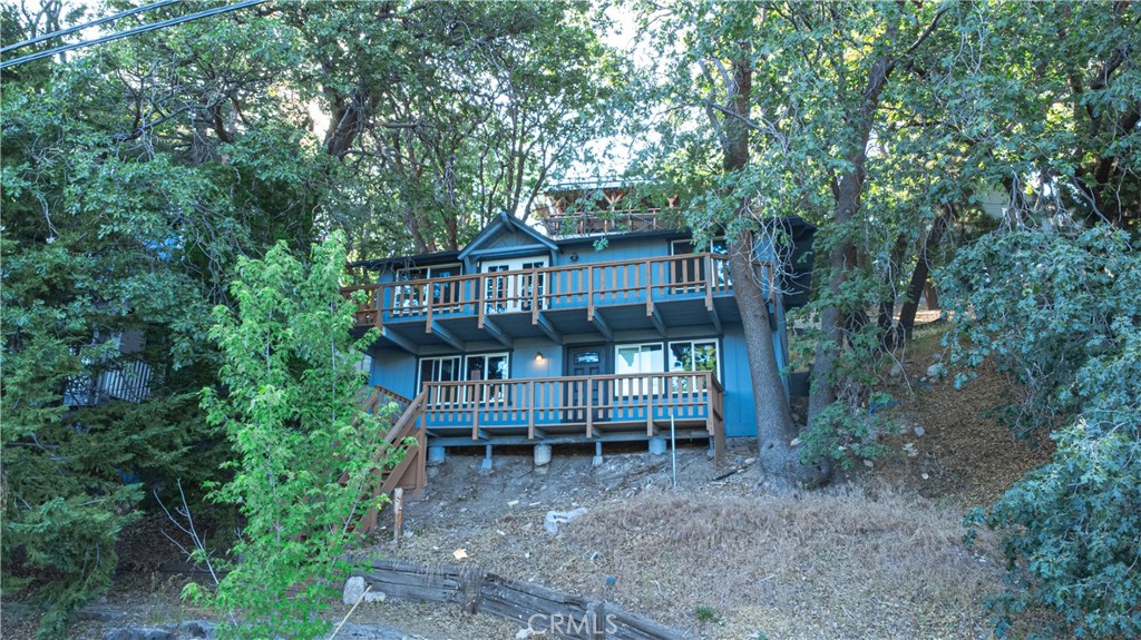 Welcome to Pine Cone Drive in the charming mountain town of Running Springs! This beautifully renovated 3-bedroom, 1-bathroom home offers just over 670 square feet of comfortable living space, perfect for a weekend getaway or full-time living. Enjoy breathtaking views right from your own front yard and take pride in owning the lowest priced home in the area.
Inside, you’ll find brand new floors, a modern kitchen, updated bathroom, new windows, and fresh paint inside and out, giving the home a crisp, move-in ready feel.
Located just minutes from Snow Valley Mountain Resort and only a short drive to Lake Arrowhead, Running Springs is known as the “gateway to the San Bernardino Mountains.” Whether you're looking to ski, hike, or simply unwind in nature, this is the perfect basecamp.
Don’t miss this rare opportunity—affordable mountain living with style and a view!