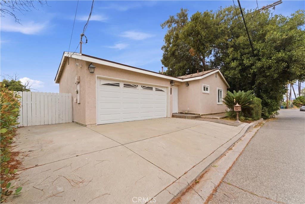 Photo of 5211 Calatrana Drive, Woodland Hills, CA 91364 (MLS # OC26091702)