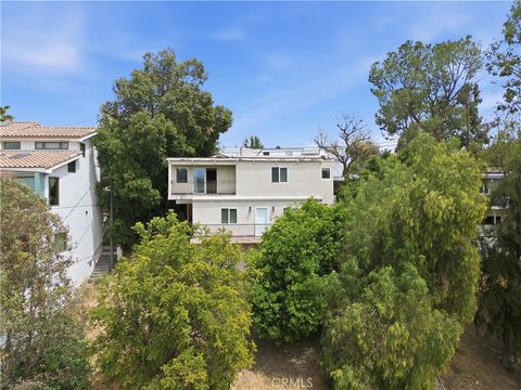 Photo of 5211 Calatrana Drive, Woodland Hills, CA 91364 (MLS # OC26091702)