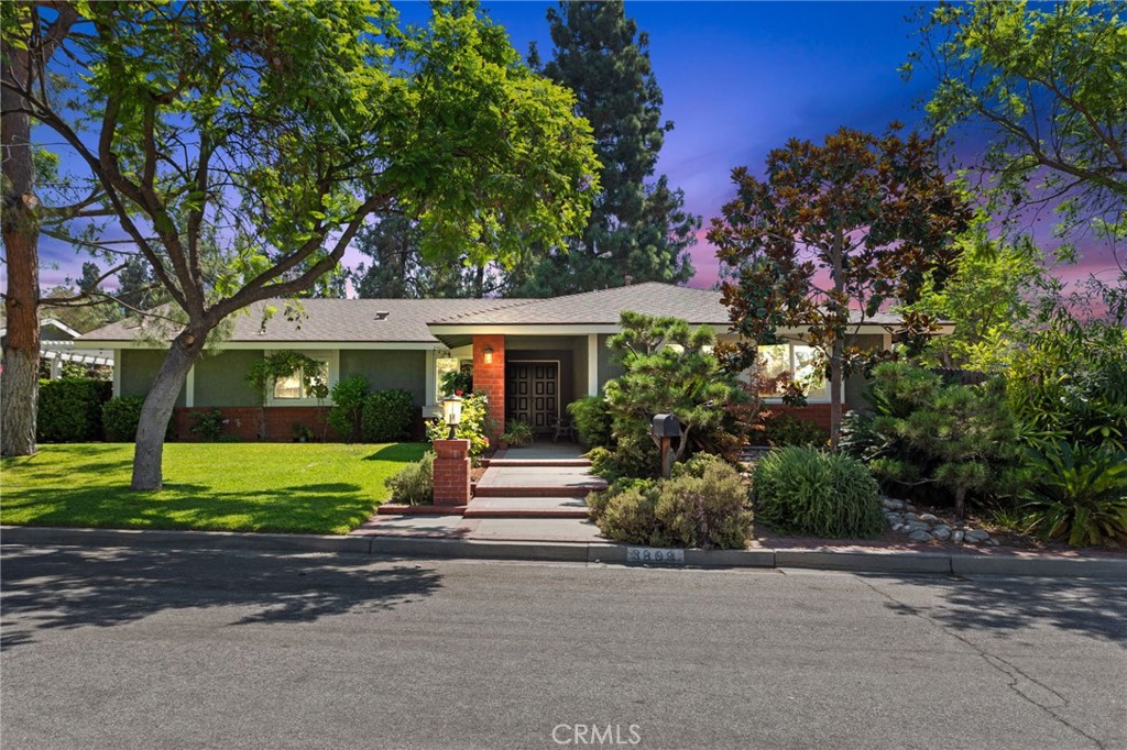 Welcome to this single story Claremont home on a serene cul-de-sac offering the perfect blend of functionality and comfort. Nestled on an expansive lot of over a quarter acre, this home features 4 bedrooms and 2 full bathrooms for comfortable family living. Inviting curb appeal with well-maintained, mature trees and landscaping leads up to the double-door entry into the foyer. The primary suite is accessed through double doors and features a sizeable walk-in closet with shelving and drawers. The slider offers access to the outdoor atrium for enjoying morning coffee or relaxing evenings. The en-suite bathroom features a granite counter with dual sinks and an oval soaking tub. Three cozy bedrooms and the secondary bathroom complete the sleeping area. The newer gourmet kitchen features beautiful wood cabinetry, granite countertops, stainless appliances, and a heavy-duty gas stove. The living room with vaulted ceiling flows into the dining room, great for entertaining. The family room includes a brick fireplace for when weather turns cool, vaulted ceiling, and ceiling fan. Gain access through the slider to the covered side patio for casual dining. The indoor laundry with built-in cabinets provides functionality and space to organize laundry essentials. The 3 car garage offers generous parking and storage, with the wide driveway providing additional space to park, as well as RV parking adjacent to the garage. Enjoy abundant fruit trees throughout the side yard and back yard. Within walking distance of acclaimed schools and just minutes to the Metrolink station, Claremont Colleges, the vibrant downtown Claremont Village, with easy access to the 210 freeway.
