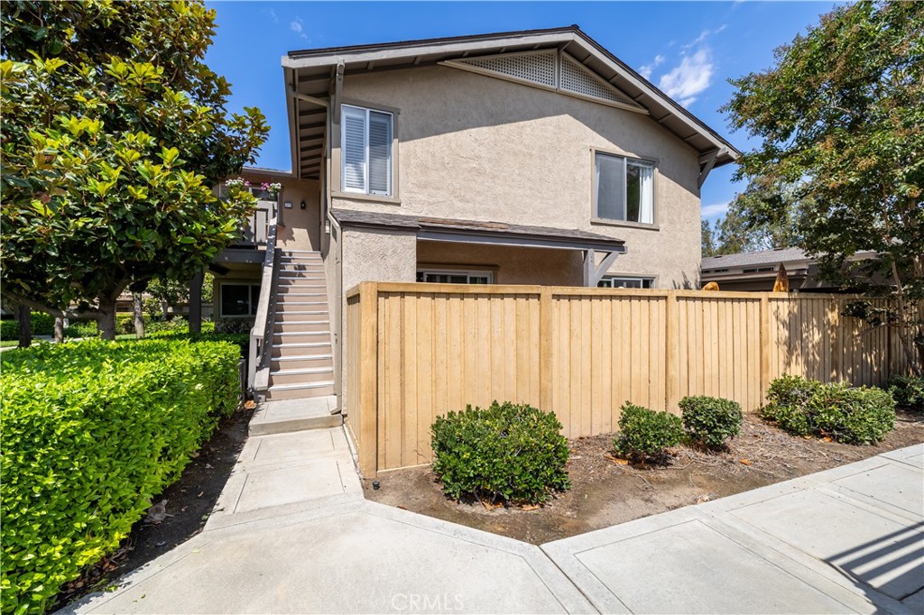 Welcome to this upgraded 3 bedroom 2 bathroom home in the desirable Woodbridge community of Irvine. Offering 1117 sq ft of light filled living space this home features a functional layout with defined living and dining areas an updated kitchen with stainless steel appliances and 5 burner gas range rich laminate wood flooring in unit laundry and a spacious private patio. The HOA maintains the entire exterior for easy living. Just steps away the Blue Lake Swim Club is undergoing a nearly 5 million renovation with renderings included in the listing. Residents enjoy access to Woodbridge’s renowned amenities including lakes pools parks playgrounds and walking paths all in a central Irvine location near top rated schools shopping and dining. Low HOA and resort style features make this home ideal for families professionals or investors. Schedule your showing today.