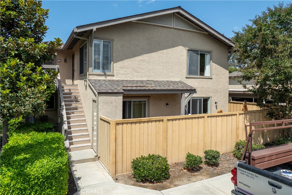 Welcome to this upgraded 3 bedroom 2 bathroom home in the desirable Woodbridge community of Irvine. Offering 1117 sq ft of light filled living space this home features a functional layout with defined living and dining areas an updated kitchen with stainless steel appliances and 5 burner gas range rich laminate wood flooring in unit laundry and a spacious private patio. The HOA maintains the entire exterior for easy living. Just steps away the Blue Lake Swim Club is undergoing a nearly 5 million renovation with renderings included in the listing. Residents enjoy access to Woodbridge’s renowned amenities including lakes pools parks playgrounds and walking paths all in a central Irvine location near top rated schools shopping and dining. Low HOA and resort style features make this home ideal for families professionals or investors. Schedule your showing today.