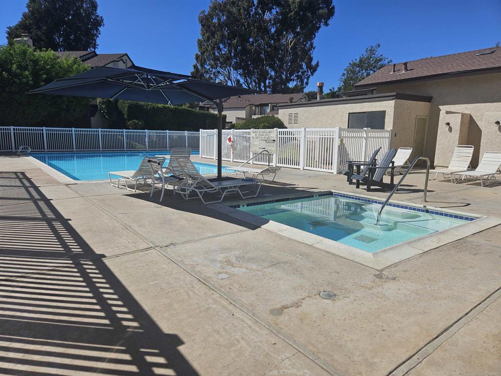 Price Improvement and Rare Turnkey Opportunity in the BONITA VIEWS Community is now available. This end-unit offers multiple upgraded features, a prime location, and modern style. Charming yet spacious has 4-bedrooms, 3 bathrooms, 2-Car Garage, 2 Patios and 1 Balcony townhome offers modern living with comfort and style. Key Features: Beautifully remodeled kitchen with quartz countertops (waterfall edge), designer cabinets & high-end refrigerator; Large living room that flows into a formal dining room with elegant chandelier lighting and custom wainscoting; Quaint Coffer Bar; Family room with cozy fireplace and direct access to oversized backyard patio; Laminate flooring and plantation shutters throughout the first floor; Two private patios perfect for entertaining or relaxing; Upstairs includes 4 spacious bedrooms & upgraded tile flooring in hallway; Primary suite with walk-in closet, bonus storage room & private balcony. Community Amenities / HOA includes access to sparkling pool and clubhouse. Additional parking spaces available for rent (first-come, first-served basis). Conveniently located near schools, shopping, dining, and major freeways – ideal for families, professionals, or anyone looking for quality living in Southern California. Don’t miss this rare opportunity!