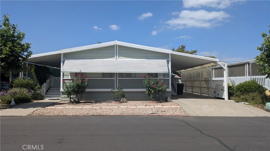 Welcome home to this 2 bedroom, 2 bath manufactured home within the Huntsman Mobile Home Park. Spacious kitchen complete with all appliances. In home washer and dryer. Spacious family and living rooms, outside patio, walk in closets and a spacious walk in master shower. Central HVAC with added air via wall unit and ceiling fans. EZ Access Wheelchair lift, low maintenance front and back yards. Gated community with plenty of amenities to include a clubhouse, fitness center, spa and pool. Also, plenty of weekly activities to enjoy.