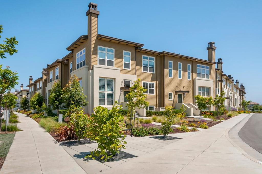 Ideal corner location for this largest TriPointe Amelia Residence which stands out amongst the others with its unique 4-bedroom 3-bath design. Light-filled LR w/ high ceiling; huge gourmet kit w/granite counters, stainless appliances; island/breakfast bar; family dining area. Balcony off kitchen. Beautiful hdwd floors. Elegant master suite w/walk-in closet. Master bath w/tub; stall shower; dual vanity. Beautiful blinds/window coverings. Downstairs office/play room. 2-car gar + extra storage throughout.