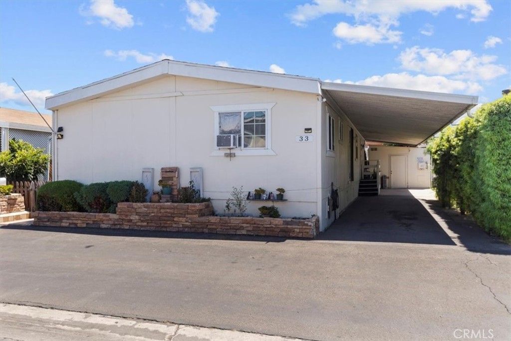 Photo of 9080 Bloomfield Avenue #33, Cypress, CA 90630 (MLS # IG26072415)