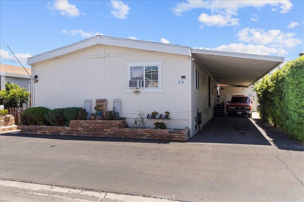 Photo of 9080 Bloomfield Avenue #33, Cypress, CA 90630 (MLS # IG26072415)