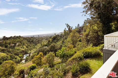 Photo of 1406 N Kenter Avenue, Los Angeles, CA 90049 (MLS # 26790917)