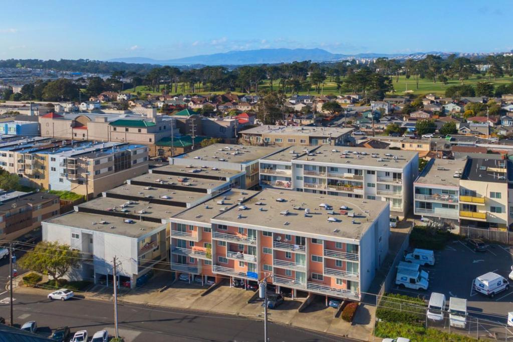 265-273 88th Street is a rare eighty (80) unit multifamily portfolio comprising five (5) extremely well-maintained apartment buildings situated on two parcels in the heart of the highly desirable Broadmoor Neighborhood of Daly City. - Offered at $26M, this stabilized asset features a unit mix of (6) 3-Br/2-Ba, (6) 2-Br/2-Ba, (4) 2-Br/1-Ba, (62) 1-Br/1-Ba, and (2) Studio units, totaling over 91,000± square feet of gross building area. With a favorable price-per-unit of $325,000 and a price-per-square-foot of $283, this opportunity has strong in-place cash flow (5.23% current cap rate & 11.33 current GRM) -- 265 88th St (4-units), 273 88th St (20-units), 1145 Edgeworth (18-units), 1157 Edgeworth (18-units), 374 89th St (20-units). SIGNIFICANT CAPITAL IMPROVEMENTS have been completed, including voluntary seismic upgrade, updated windows across all buildings, upgraded main electrical panels (25'), deck re-coating and rail painting (25'), updated water heaters, bird proofing, and extensive interior unit updates, with most units having been updated in the past 5-7 years. All units are individually metered for gas and electric, and twelve (12) units offer central forced-air heating.