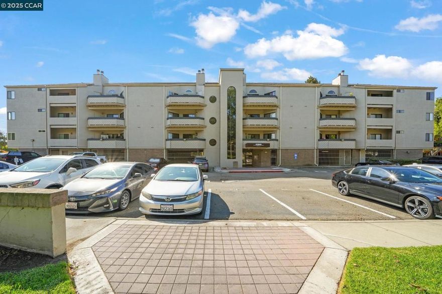 Experience refined living in this expansive 1 BD / 1.5 BA residence, perfectly situated within the private, gated Bridgeport Community. Offering 982 sq. ft. of thoughtfully designed space, this home blends style, comfort, and convenience in one exceptional package.  Step inside to discover sleek, updated laminate wood flooring, fresh designer paint, and a generously sized primary suite boasting two closets and a serene private balcony. The light-filled eat-in kitchen features a breakfast bar and flows seamlessly into the elegant dining area and inviting living room, where a gas fireplace sets the perfect ambiance. Recently upgraded appliances enhance both form and function.  The reimagined balcony invites you to unwind with tranquil views of the lush greenbelt, resort-style swimming pool, and rolling hills. For ultimate convenience, enjoy an in-unit washer and dryer, three assigned parking spaces, and access to exclusive community amenities including a clubhouse, sparkling pool, and relaxing hot tub.  Nestled in a prime Hayward location, you’re moments from Highways 92 and 880, the Peninsula, Silicon Valley, and an array of dining, shopping, parks, and top-rated schools.