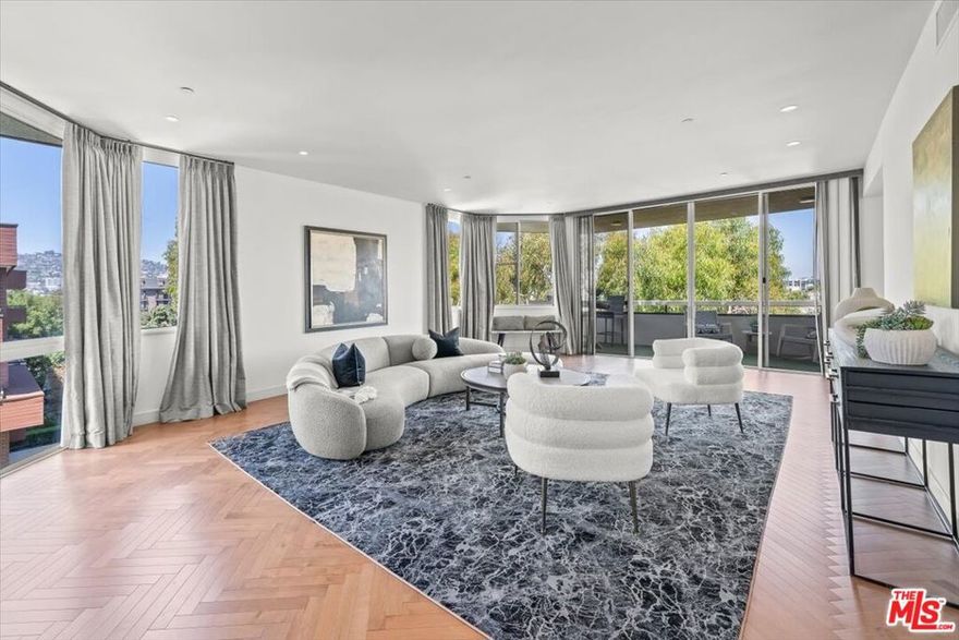 Beautiful penthouse in IV Seasons North Condominiums in prime Beverly Hills. Approximately 2800 feet with beautiful Mountain and Hollywood Hills views and is north east facing. The gorgeous 2 bedrooms + 2.5 bathrooms has beautiful new hardwood floors and was also recently renovated. Formal entry opens to elegant den and living room, and large west-facing patio perfectly suited for entertaining. This condo also features a large eat-in kitchen and a formal dining room, generous primary suite with over-sized master bath, and enormous walk-in closets. Full service building with 24-hour valet parking, doorman/security/concierge, and fitness center with pool & spa.