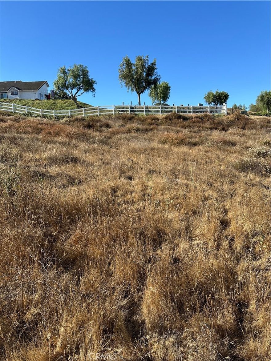 Gentle rolling 4.99 acres for your dream home (will need to build in the Southeast corner of the property due to flood plain, about 1 acre is buildable) with plenty of room for horses, fronts paved road, power & phone in Mazoe Street. Close to shopping & schools, fast developing area. Close to Temecula Valley Wineries & Vineyards, also close to Lake Skinner. Great parcel for privacy yet in town.