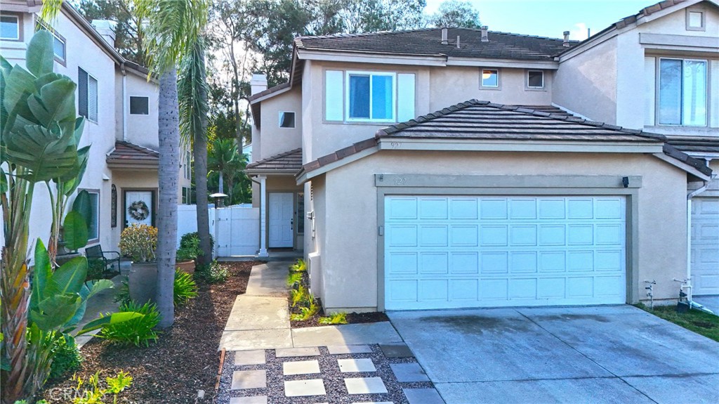 Welcome to 927 Lone Pine Lane! Nestled in the highly sought-after Summit Terrace neighborhood, this stunning single-family home offers 1,796 sq. ft. of beautifully updated living space. Featuring 3 spacious bedrooms, including dual primary suites, and 3 bathrooms, this home is designed for comfort and versatility. Enjoy high ceilings, gorgeous tile flooring, fresh interior paint, and a bright open floor plan filled with natural light from skylights and recessed lighting. The chef’s kitchen boasts white quartz countertops, stainless steel appliances, and custom cabinetry, while the bathrooms feature modern finishes with quartz vanities. Relax in the inviting family room with a gas fireplace accented by a custom wood mantle and marble subway tiles. Additional highlights include gorgeous tile floors, convenient downstairs laundry, , a large backyard perfect for entertaining and a 2-car attached garage. With a low HOA, wonderful schools, and close proximity to great restaurants, shops, and local amenities, this home truly has it all.