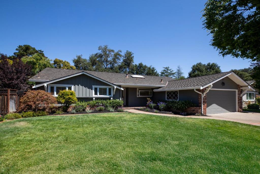 Located on nearly one-quarter acre just one mile from the Village, this home has been beautifully updated for modern living. The 3-bedroom, 2.5-bath floor plan features light-filled living areas with fresh paint inside and out, newly refinished hardwood floors, crown moldings, and a flexible layout for both formal and casual gatherings. A skylit kitchen with high-end black stainless steel appliances opens to the family room with access to the rear yard. The spacious primary suite offers direct access to the deck and gardens, and two adjacent bedrooms are well-situated in the same wing for family or guests. A combination laundry room, office center, and half-bath adds the finishing touch along with the inviting rear yard with large patio, deck, and lawn. Excellent Los Altos schools further enhance the appeal of this move-in ready home.