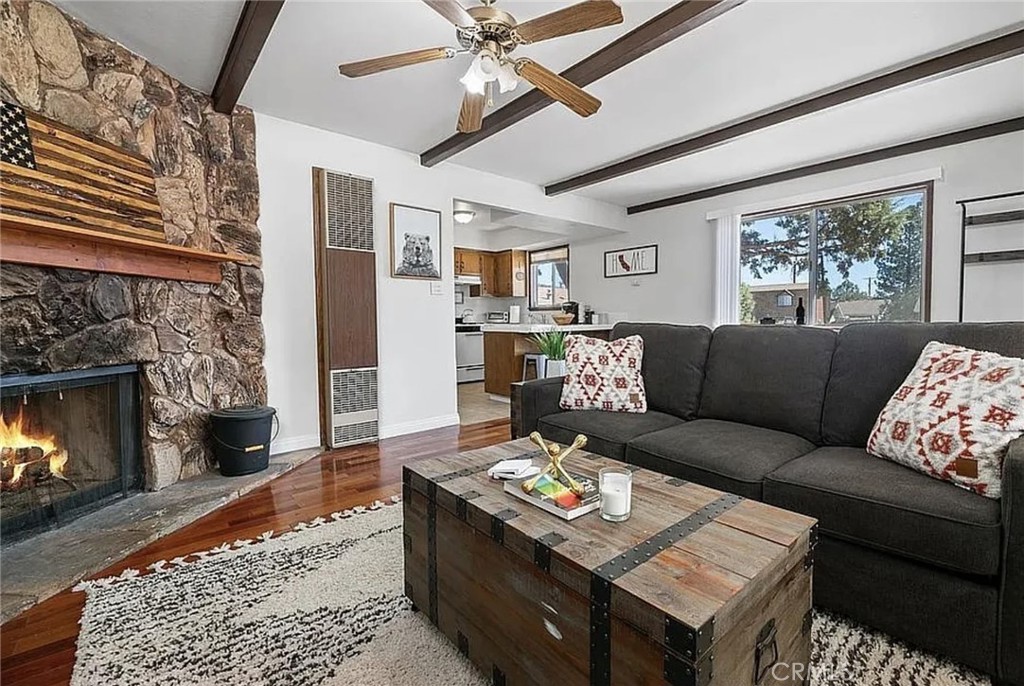 FULLY FURNISHED - All you need is your luggage! This charming cabin offers the perfect blend of comfort and convenience, ideal as both a cozy second home and a lucrative investment property. Proven successful as an Airbnb rental, this cabin has demonstrated its earning potential. Nestled in the peaceful Erwin Lake neighborhood, you'll enjoy the tranquility of the mountains while still being just 15 minutes from downtown Big Bear City, Snow Summit, and Big Bear Snow Play. Inside, you'll find a spacious living room with a sofa-sleeper, a bedroom with a queen-sized bed, and charming rustic furnishings. Cozy up by the wood-burning fireplace on chilly evenings. The cabin comes fully furnished, including all appliances, linens, and more, making it easy to move right in. Outside, a fully fenced-in yard provides a cozy outdoor space. Enjoy the deck with snow-capped mountain views, the side yard with a fire pit, and market lights for perfect summer or winter evenings. Explore nearby parks, hiking and biking trails, skiing trails, fishing spots, and camping areas. This cabin offers easy access to the beautiful Big Bear Lake, making it the perfect base for year-round adventures. Don't miss this incredible opportunity to own a piece of the Big Bear Lake lifestyle. Valid STR permit through 04/2027.