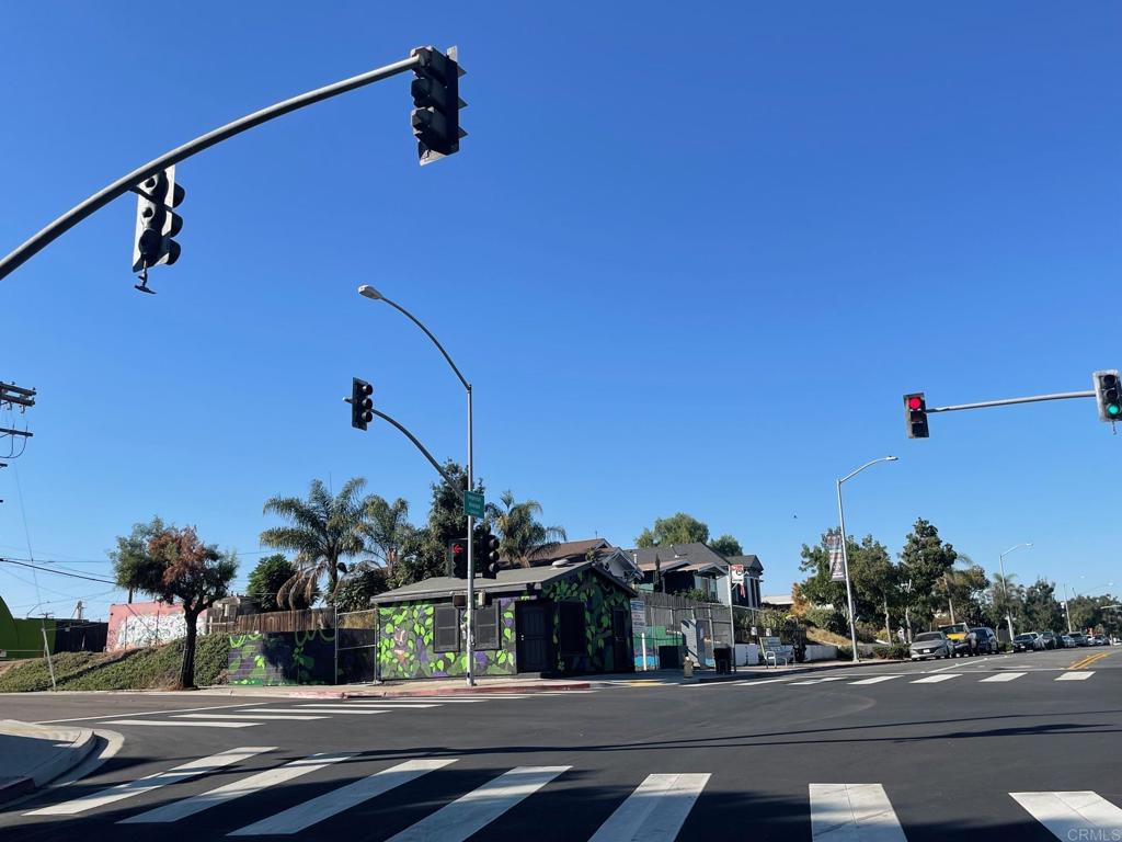 Two parcels at the corner of 32nd Street and Imperial Avenue in the "Central Park" tract of 92102 zip code. The 32nd and Commercial Street Trolley Station Orange Line is adjacent along with MTS Bus Route 4 stopping at the street frontage. Improvements include a charming built out barber shop/studio with a fenced yard. Alley access to the rear parcel, which is elevated above the front parcel. Parcel 1 has 3,113 sf and Parcel 2 has 3,697 sf for a total of 6,810 square feet of developable land. The neighborhood is known as Stockton or Grant Hill, and has quick access to multiple freeways nearby.