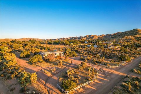 Photo of 7985 Deer Trail, Yucca Valley, CA 92284 (MLS # JT26053155)