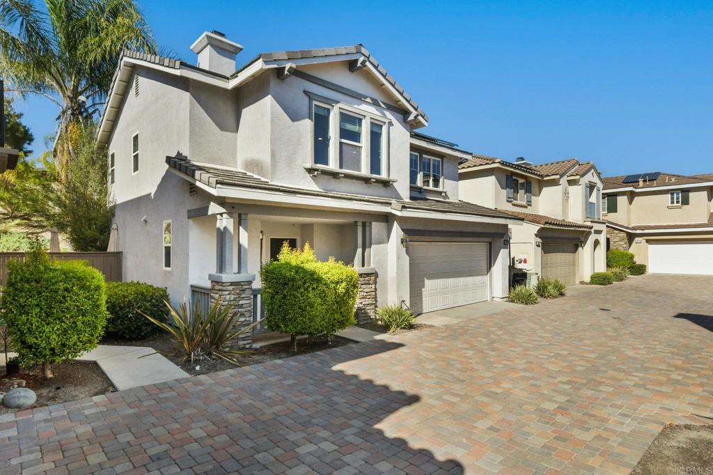 Welcome to 2811 Bear Valley Rd., a beautifully updated 3-bedroom, 2.5-bath home with 1,651 sq. ft. of living space in the highly sought-after Eastlake community of Chula Vista. Situated in the desirable Sonora Ridge neighborhood, this residence combines modern style with Spanish charm, featuring new luxury vinyl plank flooring and a remodeled kitchen with tasteful finishes. Featuring a primary suite with a large walk-in closet and primary bath. A paver lined driveway leads up to the front of this set back home, giving the owners ultimate privacy. Designed for comfort and convenience, the home offers a spacious two-car garage, a private concrete patio with a cozy fire pit, and inviting spaces for entertaining or everyday living. Residents of Sonora Ridge enjoy access to resort-style amenities including multiple pools, a clubhouse, and party areas with BBQs. Surrounded by scenic hiking trails and located near Otay Lakes, this home is also just minutes from top-rated schools, shopping, dining, and services, with quick access to the 125 freeway. Don’t miss your chance to own this move-in ready home in one of Eastlake’s most desirable neighborhoods.