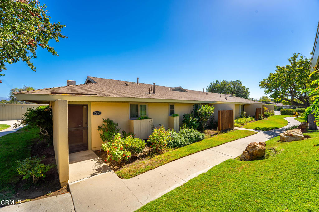 Welcome home! Single Story, end unit. 2bed, 2full bath. This updated property features File floors in the kitchen, entry, dining area, and baths and kitchen cabinets with stylish fixtures. Easy to decorate, neutral carpet, updated bathroom mirrors. The community is pet friendly, Assigned carport offers plenty of storage, Private yard and covered patio is the perfect spot to relax or entertain. 2 HOA pools, Club House, nice green belt. Adjacent to Grocery shopping but without the noise. Don't miss this one--it's a wonderful place to call home!