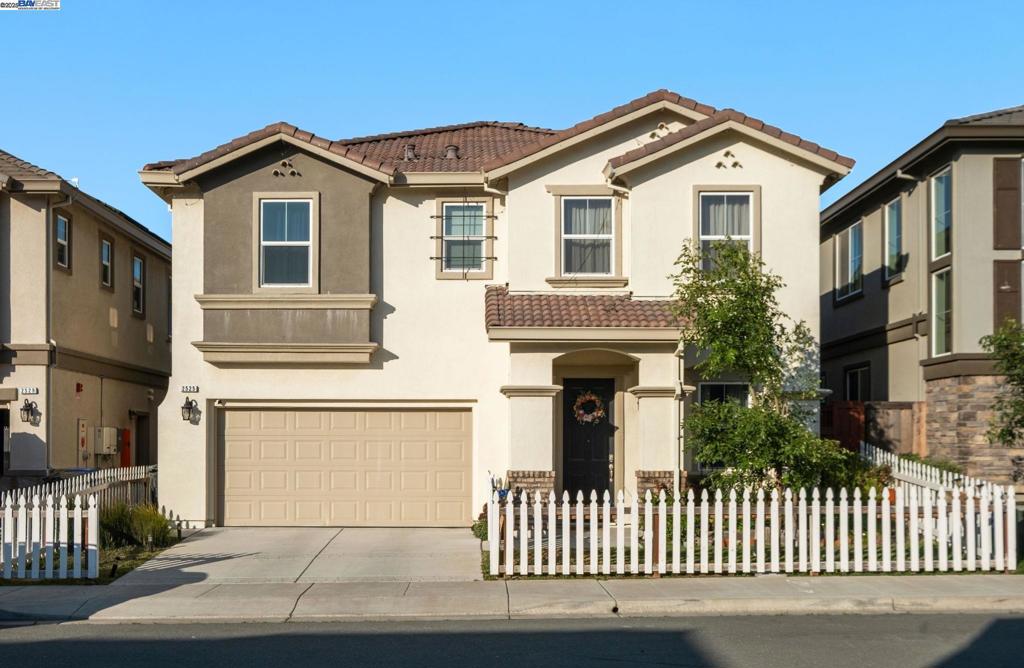 Welcome to this beautifully upgraded 5-bedroom, 3-bathroom home, featuring a 2-car garage and a desirable full bedroom and bath on the main level. This home is better than new, offering thoughtful upgrades far beyond builder standards. Enjoy upgraded hardwood flooring throughout the first floor, plush carpet with premium padding upstairs, and a chef’s kitchen with granite countertops and stylish white cabinets with brushed nickel knobs. The luxurious primary bath includes a soaking tub and upgraded fixtures, creating a spa-like retreat. Step outside to your private backyard oasis: lush green grass, blooming flowers, mature fruit trees, and a custom-built deck with a gazebo, perfect for relaxing or entertaining. Located just 5 minutes from the Pittsburg BART Station and close to schools, shopping, and freeway access. Enjoy a nearby community park—and best of all, no HOA. This move-in-ready home combines comfort, quality, and convenience in one incredible package!