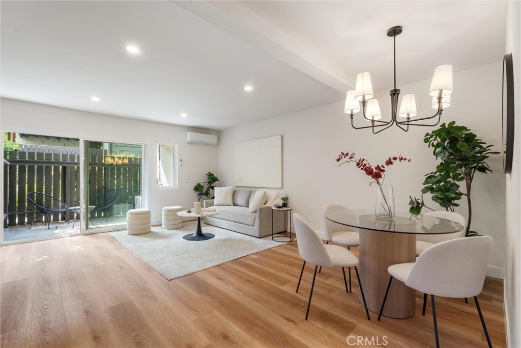 Welcome to the charming Tara Hill Condominiums in the heart of Culver City—where modern upgrades meet timeless comfort. This beautifully remodeled ground-floor residence offers 2 bedrooms and 2 bathrooms, showcasing exquisite SPC luxury vinyl flooring throughout, brand-new cabinetry, sleek appliances, and tastefully upgraded kitchen and baths. Newly installed double-pane windows and a new AC/heating system ensure year-round comfort and efficiency. Step into a spacious open-concept living and dining area that flows seamlessly to a private patio—perfect for entertaining or enjoying peaceful mornings. The patio also includes a secured storage space, complemented by a convenient hallway storage closet and two covered tandem parking spots. The kitchen gleams with stainless steel appliances, quartz countertops, and contemporary cabinetry, while the generous primary suite features ample closet space and a stylish en-suite bath. Nestled in a beautifully landscaped, pet-friendly community, Tara Hill offers resort-style amenities including two sparkling pool areas with spas, a fitness center, clubhouse, playground, BBQ grills, and community laundry facilities. The HOA provides comprehensive coverage including 24-hour gated security, water, gas, trash and recycling services, Spectrum cable and internet, earthquake insurance, and meticulous common area maintenance. Perfectly situated near major employers such as Sony and Amazon Studios, with quick access to the Expo Line and multiple freeways, this location makes commuting effortless. Just moments from vibrant Downtown Culver City, the Ballona Creek bike trail, dog parks, Westfield Mall, and West LA College, this home offers the very best of Westside living. Don’t miss this exceptional opportunity to own a true Culver City gem.