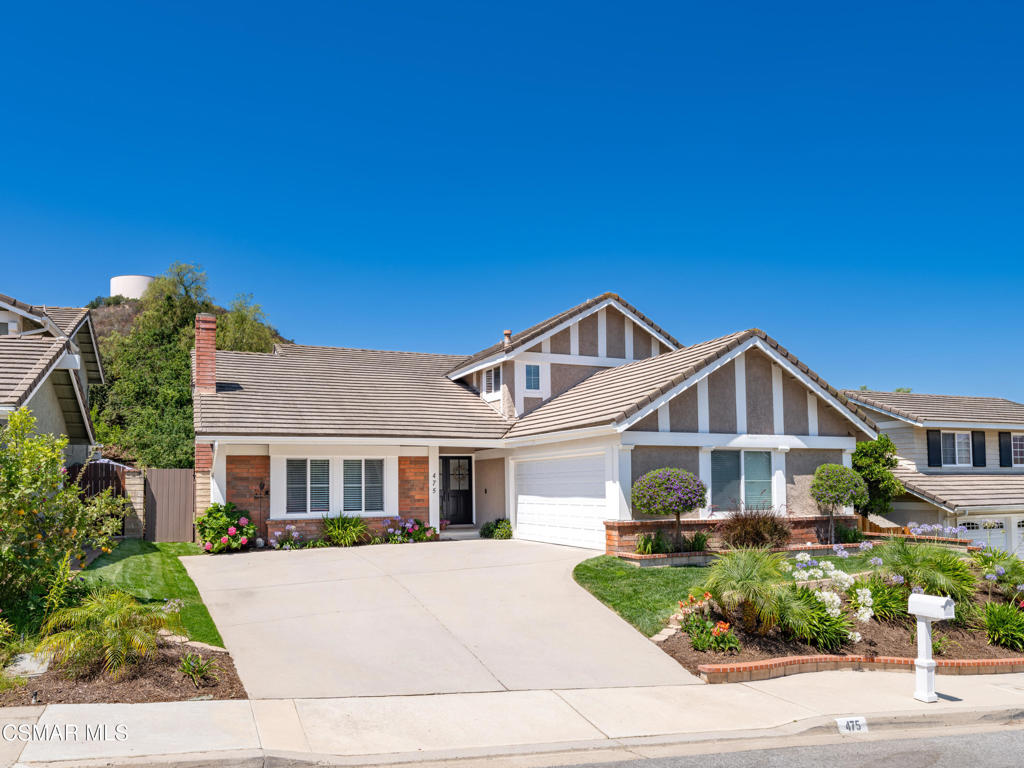 Beautifully upgraded Newbury Park home in the highly sought after Sun Tree neighborhood features 4 bedrooms, 3 bathrooms plus an added bonus room off the primary bedroom which can be used as an office, gym or nursery. Open light and bright floorplan offers over 2,700 sq. ft. with soaring ceilings, a cozy fireplace in the living room and formal dining room for special gatherings. The updated gourmet kitchen is a chef's dream with quartz countertops, a Wolf 6 burner stove, LG dishwasher, walk-in pantry and ample cabinet space with pull-out drawers. Family room is adjacent to kitchen and large windows fill the space with tons of light. Downstairs bedroom and fully remodeled bathroom are perfect for guests or office. Gorgeous custom wrought iron banister leads you upstairs where you will find the large primary bedroom with ensuite, upgraded shower/extra-large soaking tub and two vanities. Upstairs bedrooms are Jack & Jill style. Both bedrooms have walk-in closets. Large private backyard has covered patio, fruit trees and large grassy area, perfect for your backyard parties and entertaining. Other features are wood like floor downstairs, new carpet recently installed on stairs and upstairs bedrooms, freshly painted interior, freshly landscaped, newer A/C, dual pane Milgard windows throughout and a tile roof. Close to community park with dog area, award, winning schools, grocery store, Trader Joes, and tons of recreational facilities. No HOA! Hurry this one will not last!