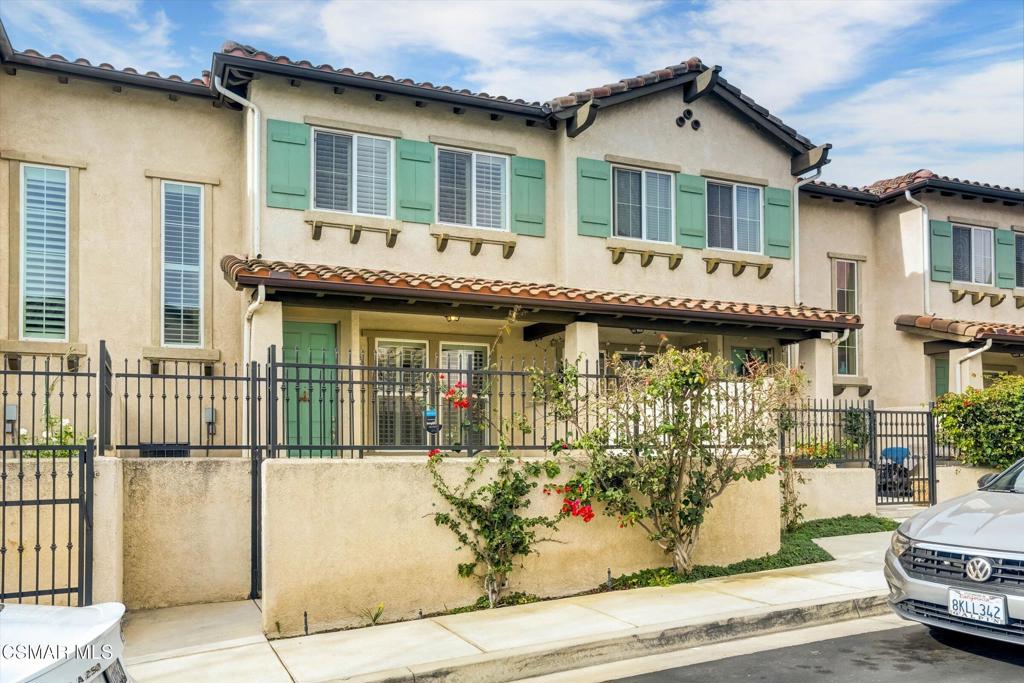 Welcome to your new home in Beautiful Dos Vientos, Newbury Park's most sought after neighborhood! Miles of open space, hiking, and biking trails, and perfectly groomed parks surround this beautiful complex. Enter through privately gated patio into warm and inviting two story townhome with 3 bedrooms, 2 1/2 baths. Open concept with large eat in kitchen, complete with upgraded stainless appliances, and granite counter top breakfast bar. Large living room with fireplace and direct access to garage with extra storage area and laundry.Bedrooms are spacious and bright Primary suite offers large walk-in closet, Generous bathroom with dual sinks, and separate tub and shower. Steps away from award winning only K-8 public school in Conejo Valley, parks, and shopping. It's not just a home, it's a lifestyle!