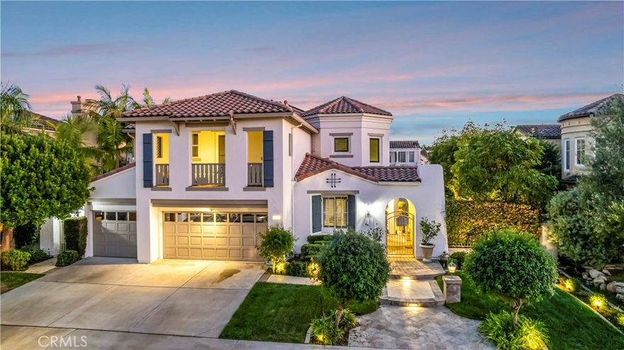 Welcome to this extraordinary residence in The Bluffs—Huntington Beach’s most prestigious and privately secured 24-hour guard-gated community. One of just 85 custom-built homes in this exclusive enclave, this stunning two-story estate offers over 4,000 square feet of luxurious living space on a nearly 9,000-square-foot lot.
Designed with elegance and modern comfort in mind, the home features 4 spacious bedrooms—all with ensuite baths—plus a private office (can be considered a 5th Bedroom), a spacious loft area, and even an elevator (one of the few homes in the community with this rare amenity). The primary suite is a retreat of its own, complete with a fireplace, spa-like bathroom with soaking jet tub, dual vanities, walk-in shower, expansive closet, and a private balcony. Secondary bedrooms also offer private balconies and walk-in closets, while a downstairs guest suite provides convenience and privacy.
Step into the dramatic foyer with its spiral staircase and cathedral ceilings, flowing into formal living and dining rooms, both adorned with elegant fireplaces and tall windows that frame the outdoors. The entertainer’s kitchen boasts high-end stainless steel appliances, Sub-Zero refrigerator, wine cooler, stunning Madagascar granite center island, prep area with seating, and a sunny breakfast nook that opens seamlessly to the spacious family room.
The backyard is an outdoor paradise—a Pebble-Tec saltwater pool and spa, firepit, covered pergola, lush garden retreat with an abundance of fruit trees and flowers, and multiple seating areas perfect for relaxing or entertaining year-round. The property also includes a three-car garage with additional driveway parking.
Situated just one mile from the sand and within walking distance to the wetlands, Huntington Club for golf and tennis, equestrian center, award-winning schools, and the vibrant Pacific City entertainment hub, this home combines the very best of coastal lifestyle and community living.
Don’t miss this rare opportunity to own in The Bluffs—where timeless luxury meets the heart of Huntington Beach.
