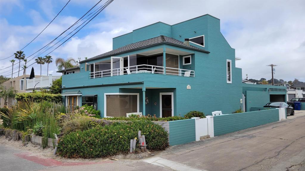NO summer rental. NO SHORT TERM RENTALS.. corner home @ 26th St & Oceanfront, one house from the beach with sit down Ocean Views. Highly sought after location, Just Renovated & upgraded: open beam ceilings, chefs kitchen w/ large center island/ 4 bedrooms & 4 baths. Master suite is on the 2nd floor with a private/ sitting room or living room for entertaining. Multiple decks for relaxing, taking in the sights or enjoying the salt air & beach atmosphere. Additional 3 bedrooms are on the 1st floor, bedroom 4 is attached (considered a GH or JADU) and only has separate exterior access/ great for help, older family or Guest(s). *Rented furnished & Available September 15, 2025 to June 15, 2026 as a block term rental - "just bring your own linens." Zippy, upgraded, with good white water ocean VIEWS! Steps to the beach. One of the bedrooms and a full bath have a separate entrance off of the interior gated patio. Have Guests? Lots of beach parking, a real premium! Light and bright, nicely furnished. Great corner location, Upstairs master suite with sitting room, upstairs deck with white water ocean views. Parking on site for 5 cars - 2 car garage. Neighborhood: Del Mar Beach Colony NOTE: $18000 a Month plus security deposit. AVAILABLE September 15 thru June 15th LONG TERM ONLY. Tenant pays all utilities, inc. cable and internet/modem