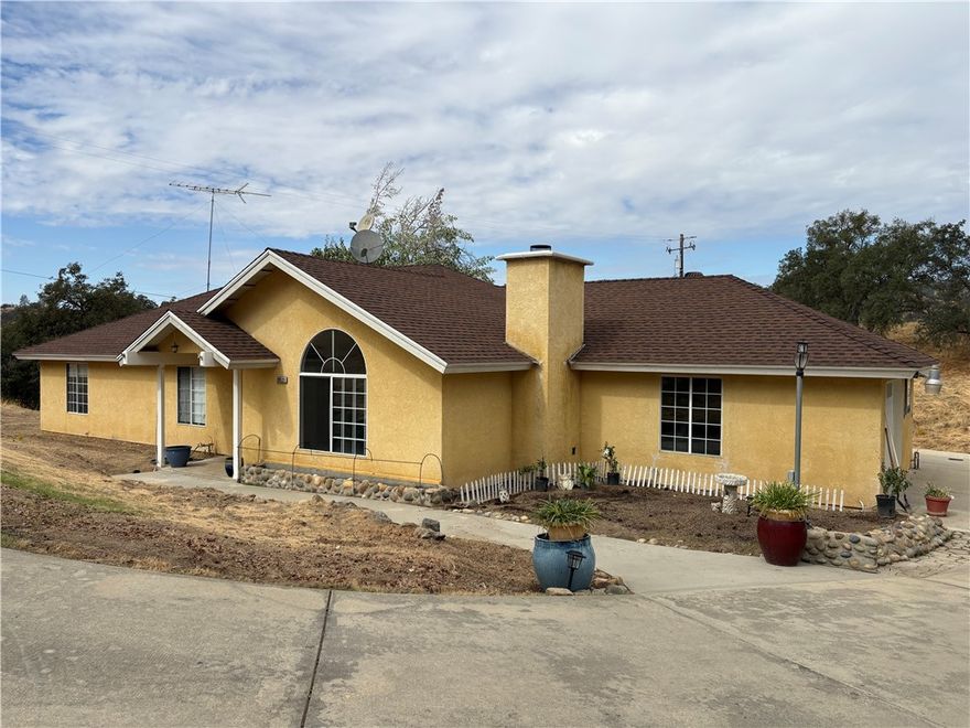 This home has some extra's for the whole family. This 1800 Sq. Ft. 3 Bedroom, 2 Bath W/Oversized finished off Garage W/Built-in Cabinets for ALL your storage. Plus a separate Approximately 840 Sq. Ft. Garage/Shop /3 pullup doors, complete bathroom W/Shower, skylights for extra daylight. Just think of all the family could enjoy doing all those planned projects. Plenty of parking, concrete driveway for easy maintenance, plus areas for planting your flowers, plenty of room for your garden area, easy access to water. Kitchen has plenty of storage, newer electric stove, breakfast bar, laundry room W/Washer & dryer plus a pantry. 3 ample size bedrooms, master bedroom, sliding doors to patio area, master bath, double sinks, shower, spa tub for relaxing after a full day of chores. Yosemite Lakes Park Offers- Golf, Free Swimming, Summer Concerts at the Club House, The Yosemite Bar & Grill for your dining pleasure inside or on the deck to enjoy the Blue Heron Lake and Grounds. So many activities, Yosemite National Park. Bass Lake, Plus many other Lakes, Oakhurst, Mariposa, Fresno and the List goes on. Bring your Realtor and imagine your plans for this property.