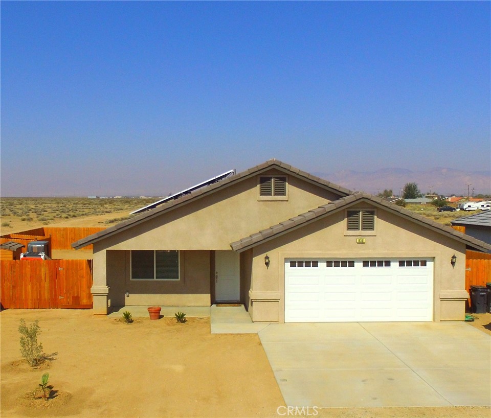 GORGEOUS HOME! QUIET AREA! BEAUTIFUL VIEWS! PAID OFF SOLAR! Take a look at this super clean property, complete with 4 spacious bedrooms, 2 very clean bathrooms, 1637 sq.ft. of open living space, built in 2022, beautiful kitchen with quartz counter tops, stainless steel appliances, large breakfast bar, wide open living room, roomy dining area, LVT water proof flooring, indoor laundry, 2 car attached & finished garage with automatic opener, tankless water heater, full privacy wood fencing, close to new schools, shopping & restaurants. Come check it out!