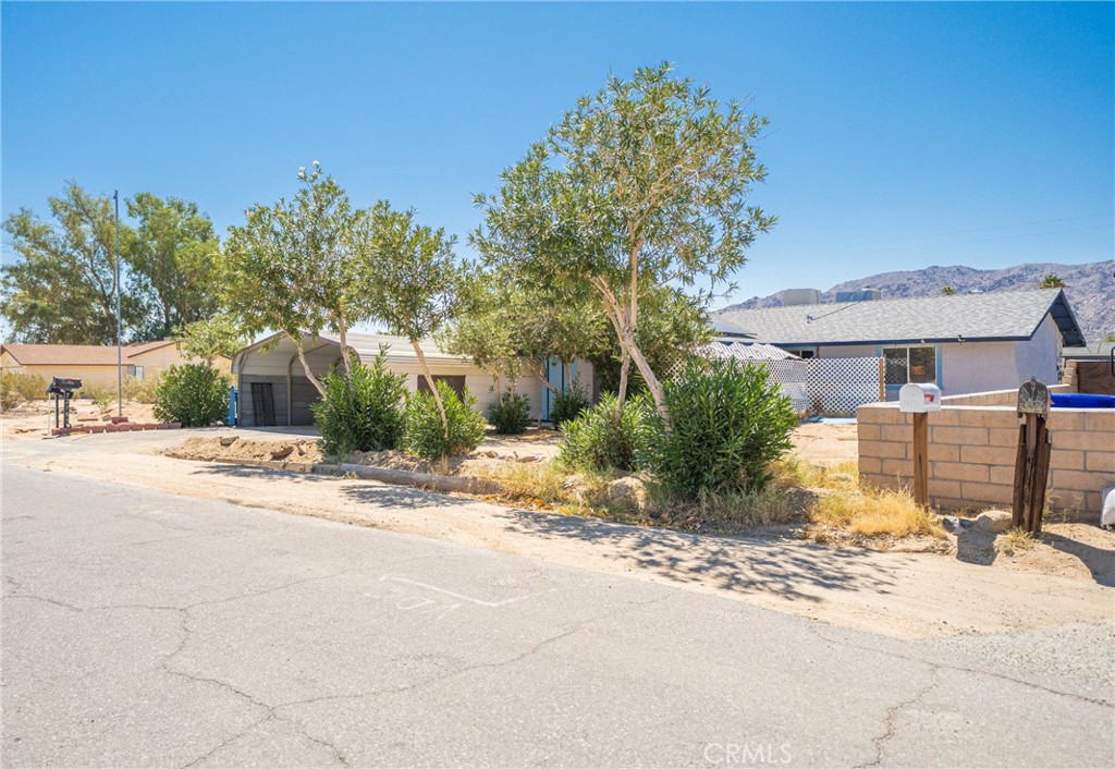 Welcome to Sunnyvale! Your desert retreat in the heart of Twentynine Palms! This charming single-story home offers 3 spacious bedrooms, 2 bathrooms, plus a versatile bonus area perfect for a home office, hobby space, or guest lounge. Spanning 1,254 sq. ft., this residence blends comfort and functionality with a warm fireplace for cozy evenings, central heating and air for year-round comfort, a water softener, and an inviting layout designed for easy living.
The bright, open living space flows seamlessly into a well-appointed kitchen and dining area, ideal for gatherings with friends and family. A convenient attached 2-car garage, a carport in front, and additional driveway space provide plenty of parking. New kitchen appliances and granite countertops 3years old $ 20000,
rain, soft home water system $10000
2 car garage drywall closure and 2 car port .
Car port $1200
Concrete block fence in backyard yard. $15000
Central air and heat system and master swap cooler.
Solar panels $240 month for electric bill.
Big storage shed
$1200
2 year old new and updated to 220 electric box $10500
2 year old hot water heater
20 x 30 in close play room w AC and Heater.
12 person jacuzzi
2 year old new roof.
No other home has all of these things in those homes.
Set on an 8,680 sq. ft. lot, the backyard is a blank canvas for your outdoor vision—already featuring a storage shed for tools, gear, or creative projects. Enjoy evenings under the desert stars, host weekend BBQs, or cultivate your own garden oasis.
Built in 1984 and lovingly maintained, this home is just minutes from local shops, schools, dining, and the iconic Joshua Tree National Park—making it an ideal primary residence, vacation getaway, or investment property. Experience the beauty, peace, and adventure of desert living—your Twentynine Palms lifestyle starts here!