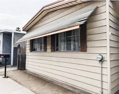 Photo of 16600 Orange Avenue #77, Paramount, CA 90723 (MLS # DW26064963)