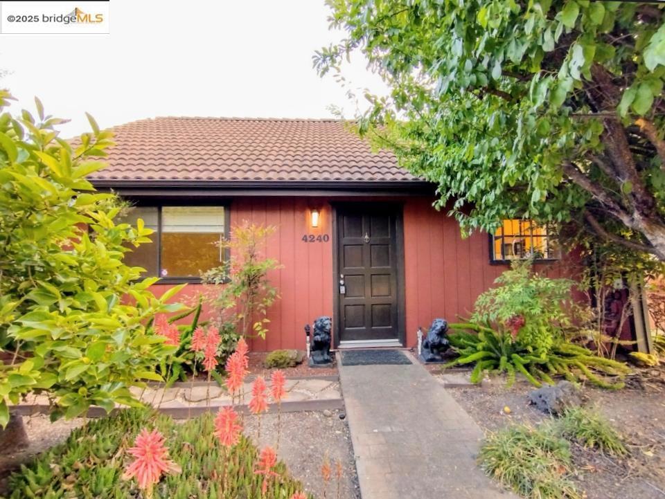 Welcome to 4240 Adeline Street — a rare opportunity to own a spacious, one-level attached single family home in a quiet enclave on the Emeryville/Oakland border. This well-maintained 3br/2bath residence is part of an intimate 8-unit development with NO HOA fees. Step inside to a bright living room featuring vaulted ceilings and abundant natural light. The fully equipped kitchen is just off the entry, perfect for cooking and entertaining. All three bedrooms and two full bathrooms are thoughtfully placed on the left side of the home. A private, enclosed backyard separates the main house from the detached 2-car garage, offering ideal space for gardening, outdoor dining, or relaxing. Perfect for families or professionals seeking comfort and convenience in a prime location. This is a quiet residential setting, next to Yu Ming Charter School; Close to shops, transportation, and commuter routes. This rare gem offers privacy, space, and location — a perfect place to call home. Don’t miss it!